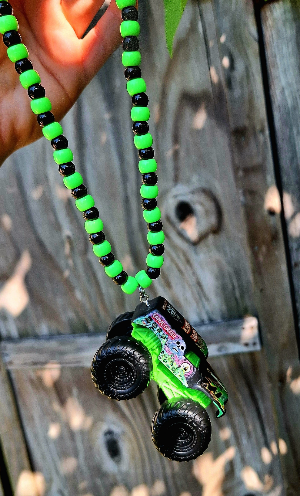 Grave digger truck necklace