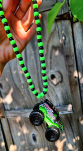 Grave digger truck necklace